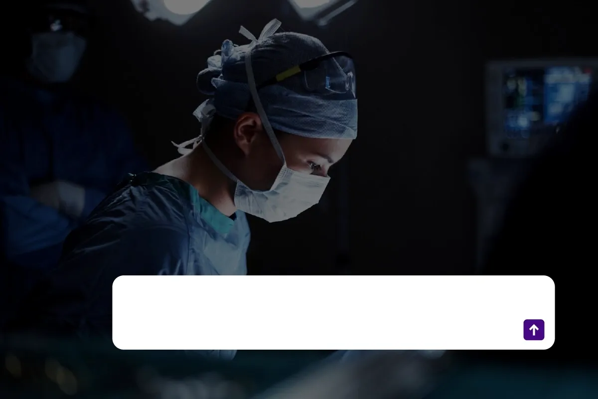 an image of a surgeon standing in a dark room